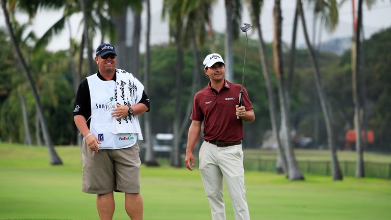 Kisner and his caddie Duane Bock see the funny side after he mis-read his eagle putt