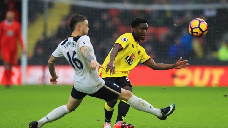 WATFORD, ENGLAND - JANUARY 01:  Brandon Mason of Watford is faced by Kieran Trippier of Tottenham Hotspur during the Premier League match between Watford a