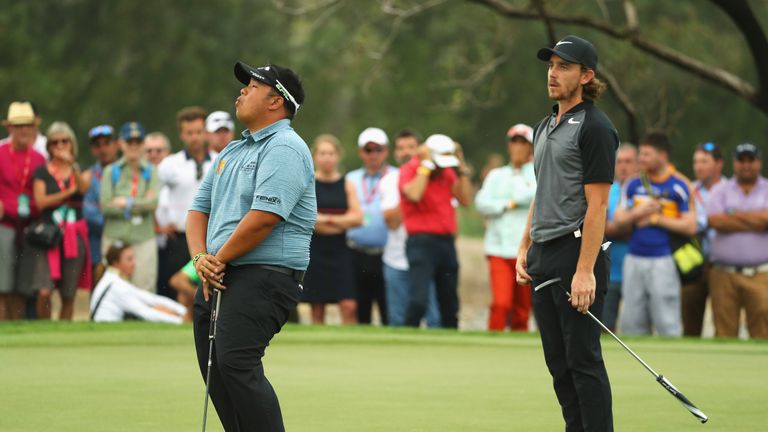 ABU DHABI, UNITED ARAB EMIRATES - JANUARY 22:  Kiradech Aphibarnrat of Thailand reacts after missing his birdie putt on the 16th green during the final rou