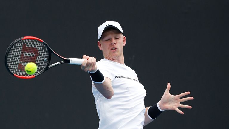 Kyle Edmund of Great Britain plays a forehand