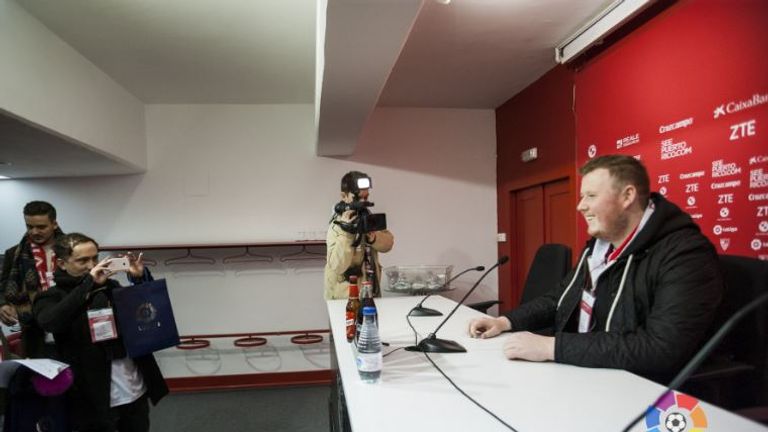 Adam poses in the Sevilla press room