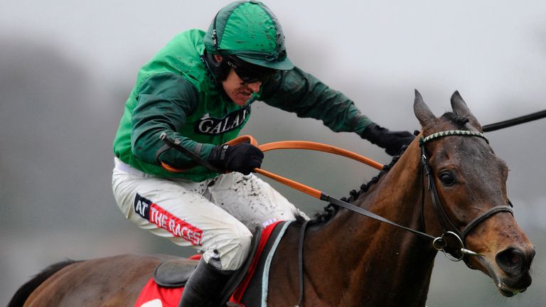 Barry Geraghty riding L'Ami Serge clear the last to win the 32Red Tolworth Hurdle at Sandown