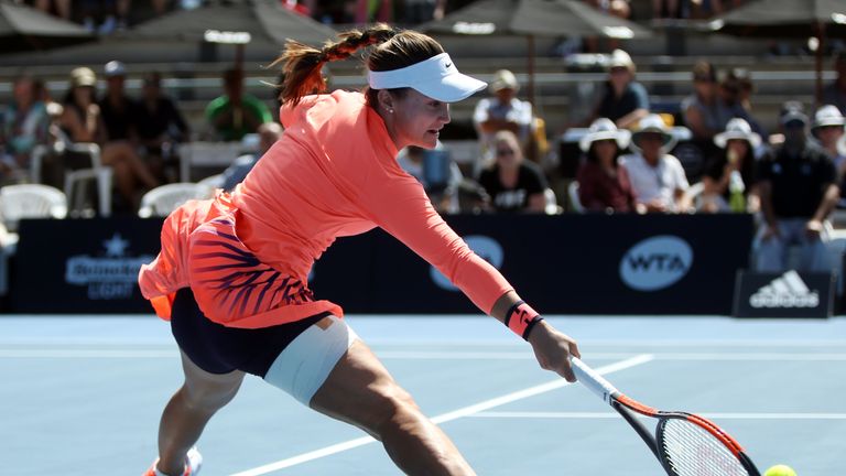 American Lauren Davis plays a shot against Croatia's Ana Konjuh during their women's singles final match at the WTA Auckland Classic tennis tournament in A