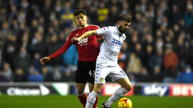 Stuart Dallas of Leeds United and Matty Cash of Nottingham Forest in action 