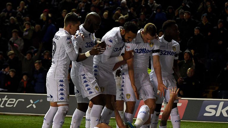  Chris Wood of Leeds celebrates with teammates after scoring the opening goal