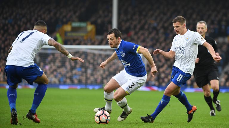 LIVERPOOL, ENGLAND - JANUARY 07: Leighton Baines (C) of Everton competes against Danny Simpson (L) and Marc Albrighton (R) of Leicester City during the Emi