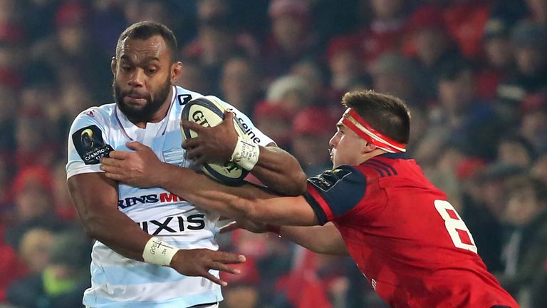 Racing 92's Fijian lock Leone Nakarawa (L) is tackled by Munster's CJ Stander (R) during the Champions Cup at Thomond Park 21/01/2017