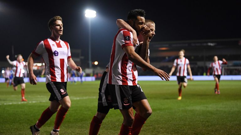 Nathan Arnold of Lincoln City celebrates after scoring the late winner