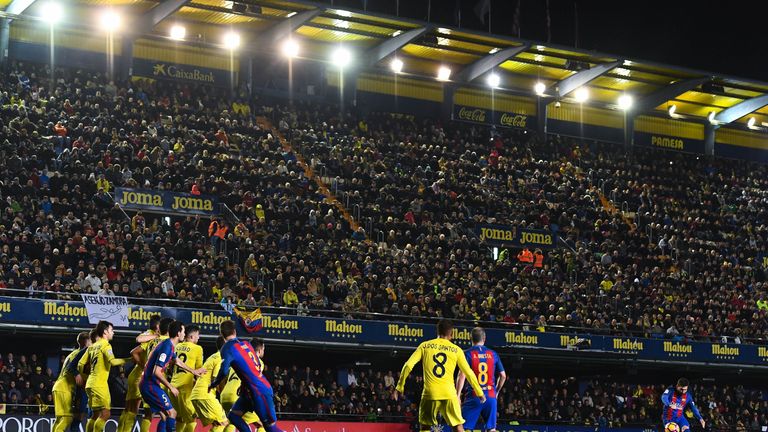 VILLARREAL, SPAIN - JANUARY 08:  Lionel Messi of FC Barcelona scores his team's first goal during the La Liga match between Villarreal CF and FC Barcelona 