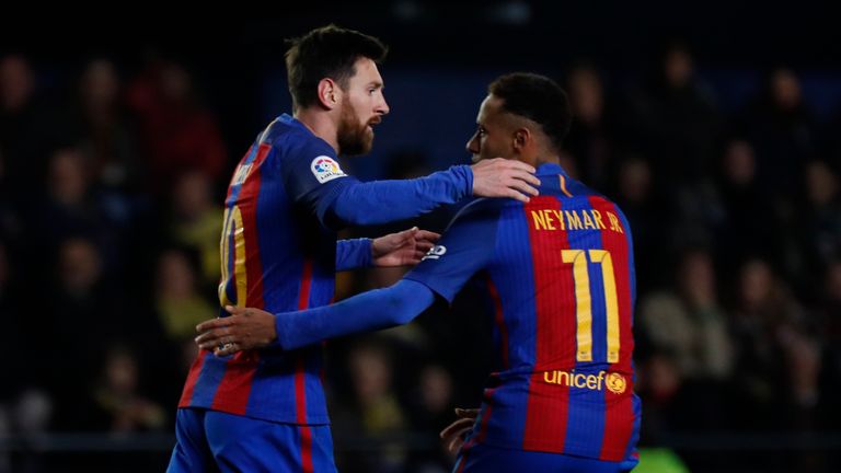 Barcelona's Argentinian forward Lionel Messi (L) celebrates with Barcelona's Brazilian forward Neymar after scoring during the Spanish league football matc
