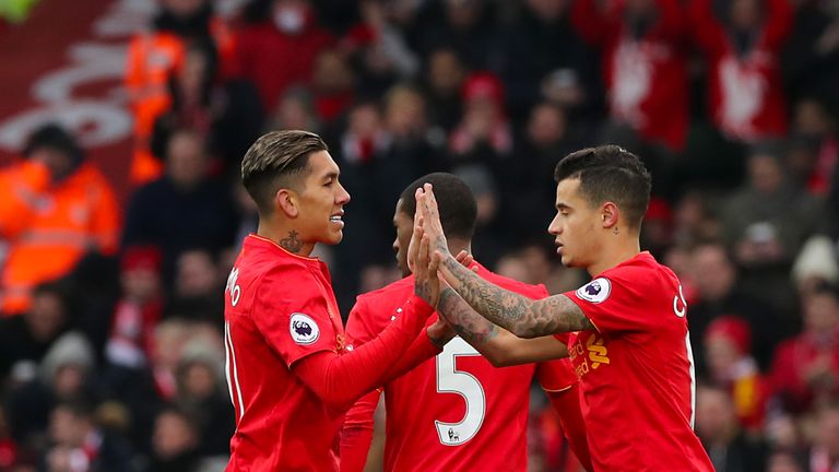 Liverpool's Roberto Firmino celebrates scoring his side's first goal of the game with Liverpool's Philippe Coutinho during the Premier League match at Anfi