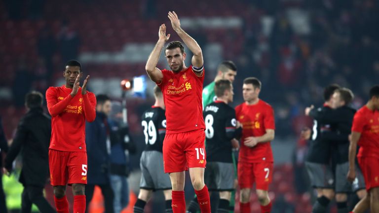 LIVERPOOL, ENGLAND - JANUARY 25: Jordan Henderson of Liverpool applauds supporters following defeat in the EFL Cup Semi-Final Second Leg match between Live
