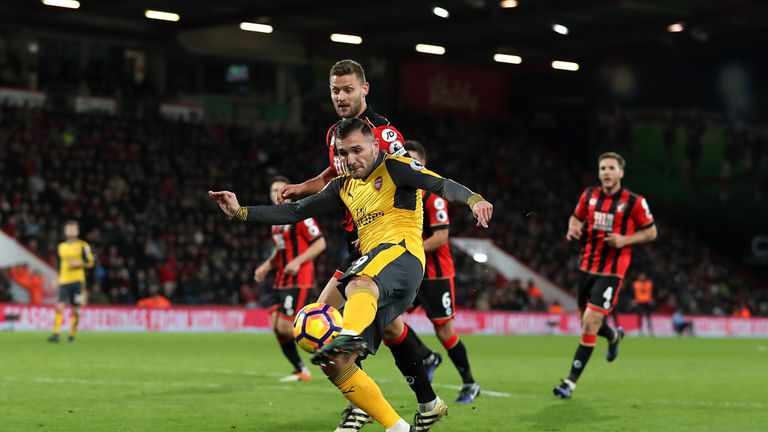 Arsenal's Lucas Perez scores his side's second goal of the game 