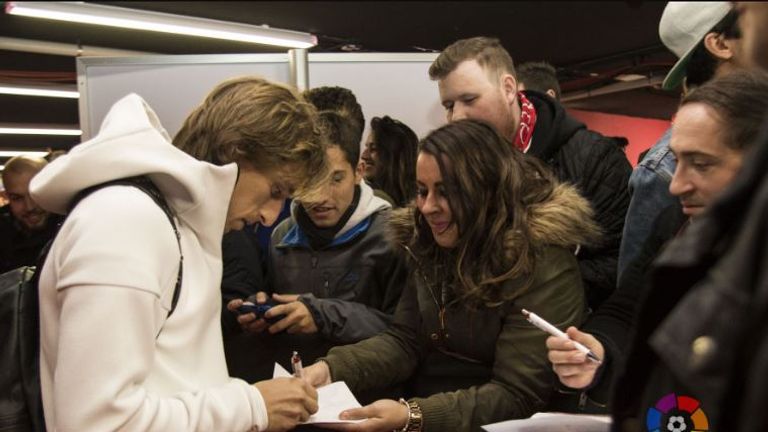 Luka Modric signs an autograph for Kate