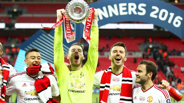 Manchester United celebrate their FA Cup success last season at Wembley