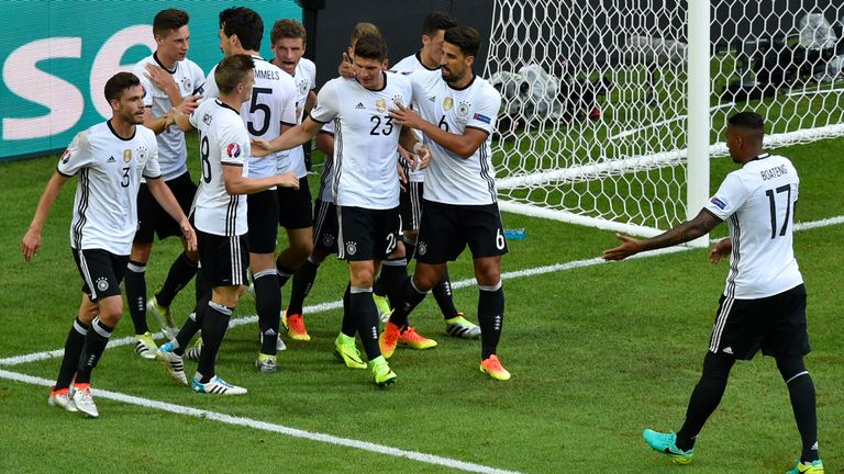 Germany's forward Mario Gomez (C) celebrates with teammates after scoring during the Euro 2016 round of 16 football match between Germany and Slovakia at t