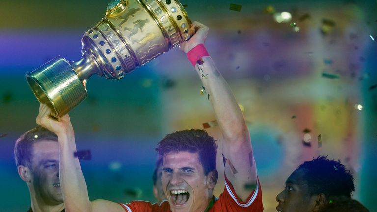 Bayern Munich's striker Mario Gomez celebrates with the 