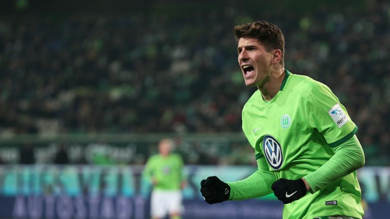 WOLFSBURG, GERMANY - DECEMBER 17: Mario Gomez of Wolfsburg reacts during the Bundesliga match between V