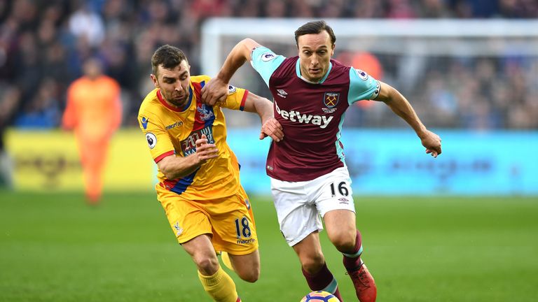 Mark Noble gets away from James McArthur