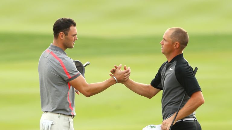 Martin Kaymer and Alex Noren during the second round of the Abu Dhabi HSBC Championship