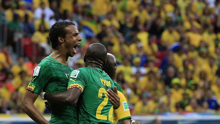 Cameroon's midfielder Joel Matip (L) celebrates scoring against Brazil in 2014 World Cup