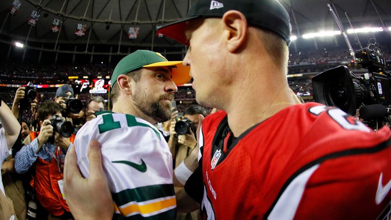 ATLANTA, GA - JANUARY 22:  Matt Ryan #2 of the Atlanta Falcons speaks to Aaron Rodgers #12 of the Green Bay Packers after the NFC Championship Game at the 