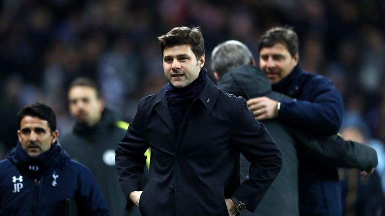 MANCHESTER, ENGLAND - JANUARY 21: Mauricio Pochettino, Manager of Tottenham Hotspur makes his way to his seat prior to the Premier League match between Man