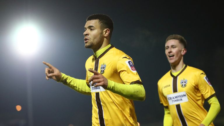 KINGSTON UPON THAMES, ENGLAND - JANUARY 17:  Maxime Biamou of Sutton United celebrates scoring his sides second goal during the Emirates FA Cup third round