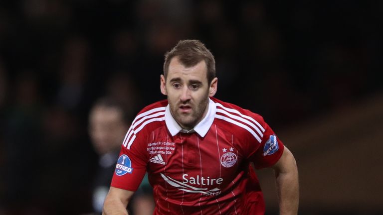 Niall McGinn scored twice to help Aberdeen to a 3-0 win over Dundee