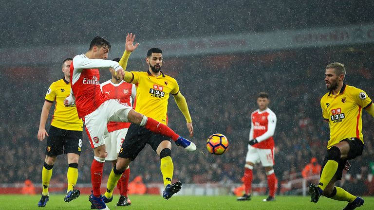 Arsenal's Mesut Ozil makes an attempt at goal during the Premier League match at The Emirates Stadium, London.