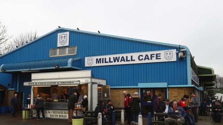 LONDON, ENGLAND - JANUARY 07:  Supporters gather outside a cafe during the Emirates FA Cup third round match between Millwall and AFC Bournemouth at The De
