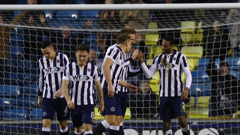 LONDON, ENGLAND - JANUARY 07: Shaun Cummings of Millwall celebrates with team mates after scoring his sides second goal during the Emirates FA Cup third ro