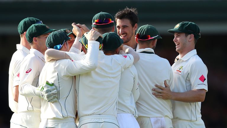 SYDNEY, AUSTRALIA - JANUARY 05:  Mitchell Starc of Australia celebrates with team mates after dismissing Sarfraz Ahmed of Pakistan during day three of the 