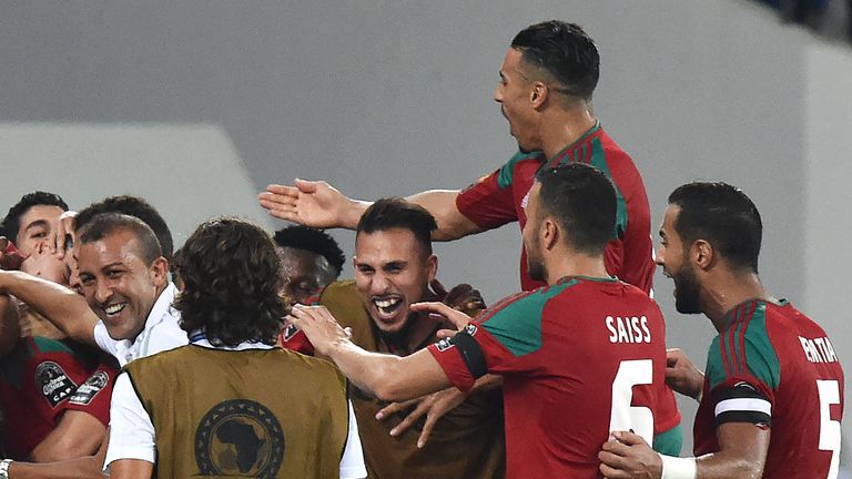 Morocco's players celebrate their third goal against Togo