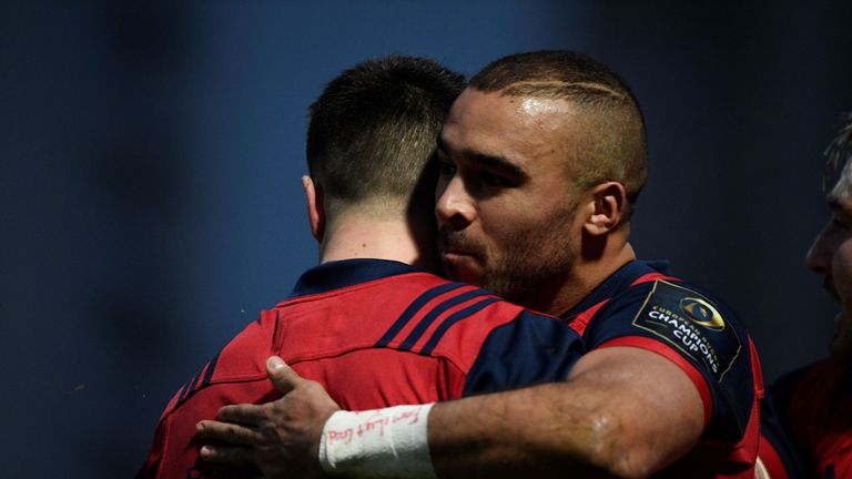 Munster full-back Simon Zebo celebrates scoring the opening try