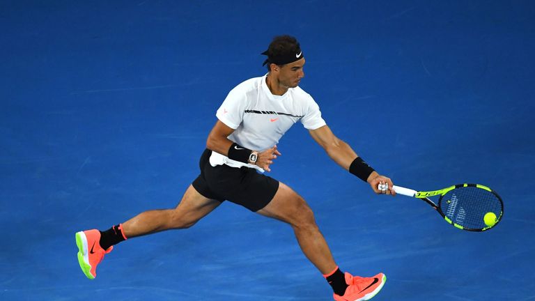 MELBOURNE, AUSTRALIA - JANUARY 25:  Rafael Nadal of Spain plays a forehand in his quarterfinal match against Milos Raonic of Canada on day 10 of the 2017 A