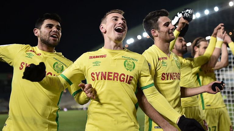 Nantes' players celebrate at the end of the French L1 football match between Nantes and Caen