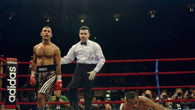 Prince Naseem Hamed goes to a neutral corner after knocking down Kevin Kelley during a fight at Madison Square Garden in New York City.