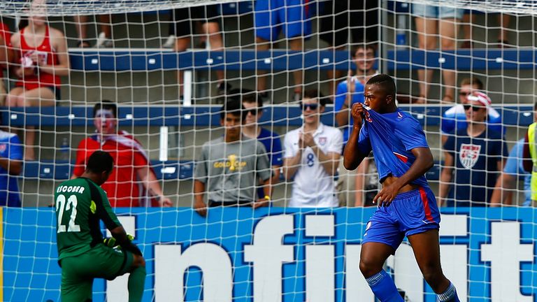 Nazon Duckens (right) of Haiti celebrates after scoring a goal against Honduras
