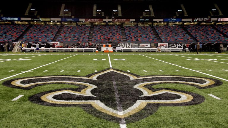 NEW ORLEANS - SEPTEMBER 25:  An interior view of the field showing the New Orleans Saints logo, a fleur-de-lis, in the newly refurbished Superdome prior to