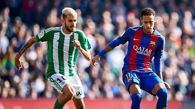 SEVILLE, SPAIN - JANUARY 29: Neymar Jr of FC Barcelona (R) being followed by Dani Ceballos of Real Betis Balompie (L) during the La Liga match between Real