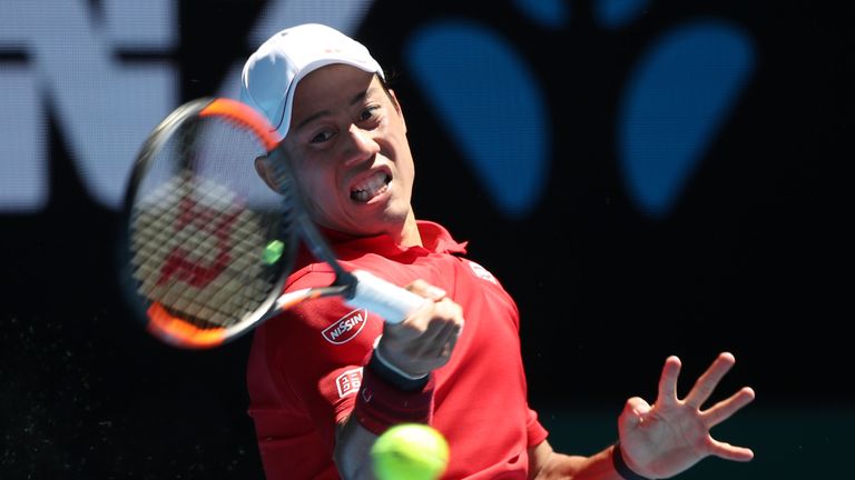 MELBOURNE, AUSTRALIA - JANUARY 16:  Kei Nishikori of Japan plays a forehand in his first round match against Andrey Kuznetsov of Russia on day one of the 2