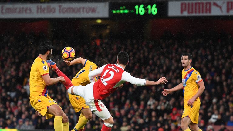 LONDON, ENGLAND - JANUARY 01:  Olivier Giroud of Arsenal scores the opening goal during the Premier League match between Arsenal and Crystal Palace at the 