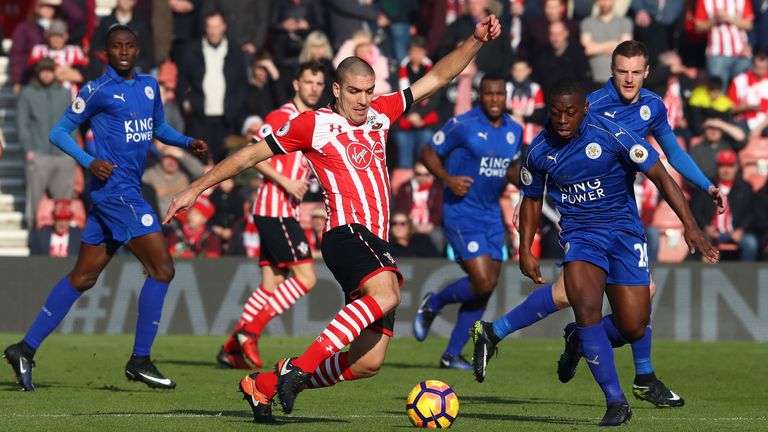 SOUTHAMPTON, ENGLAND - JANUARY 22: Oriol Romeu of Southampton and Nampalys Mendy of Leicester City compete for the ball during the Premier League match bet