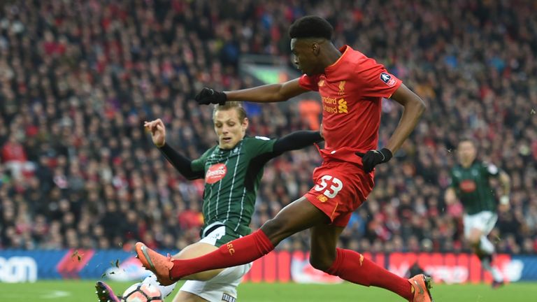 Liverpool's English midfielder Ovie Ejaria (R) has an unsuccessful shot during the English FA Cup third round football match between Liverpool and Plymouth