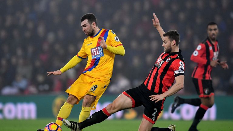 BOURNEMOUTH, ENGLAND - JANUARY 31:  James McArthur of Crystal Palace is tackled by Simon Francis of AFC Bournemouth during the Premier League match between