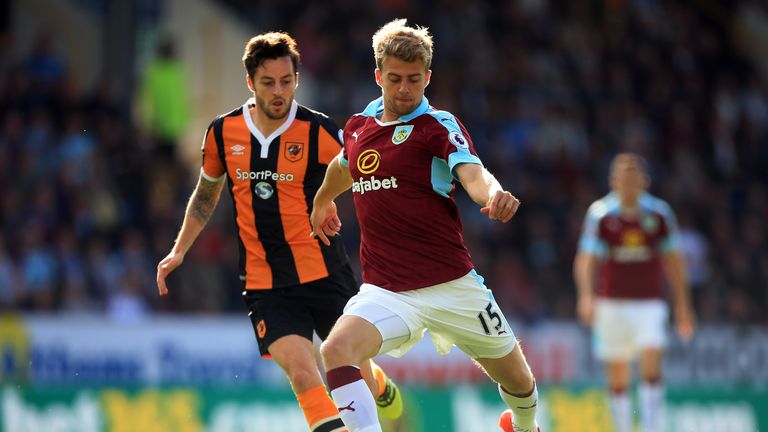 BURNLEY, ENGLAND - SEPTEMBER 10:  Patrick Bamford of Burnley (R) shoots during the Premier League match between Burnley and Hull City at Turf Moor on Septe