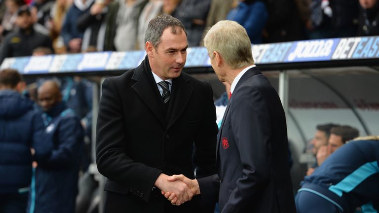 Paul Clement shakes hands with Arsene Wenger