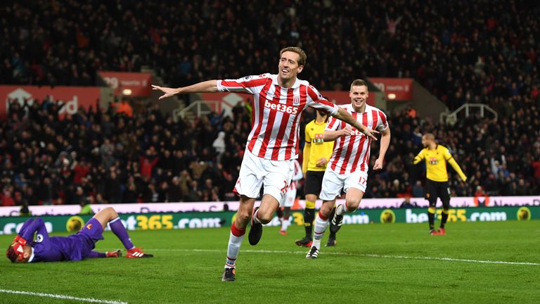 STOKE ON TRENT, ENGLAND - JANUARY 03: Peter Crouch of Stoke City celebrates scoring his team's second goal during the Premier League match between Stoke Ci