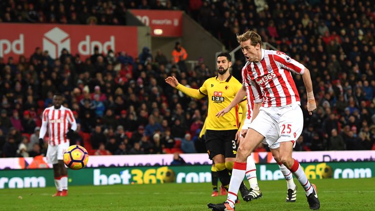STOKE ON TRENT, ENGLAND - JANUARY 03: Peter Crouch of Stoke City scores his side's second goal  during the Premier League match between Stoke City and Watf